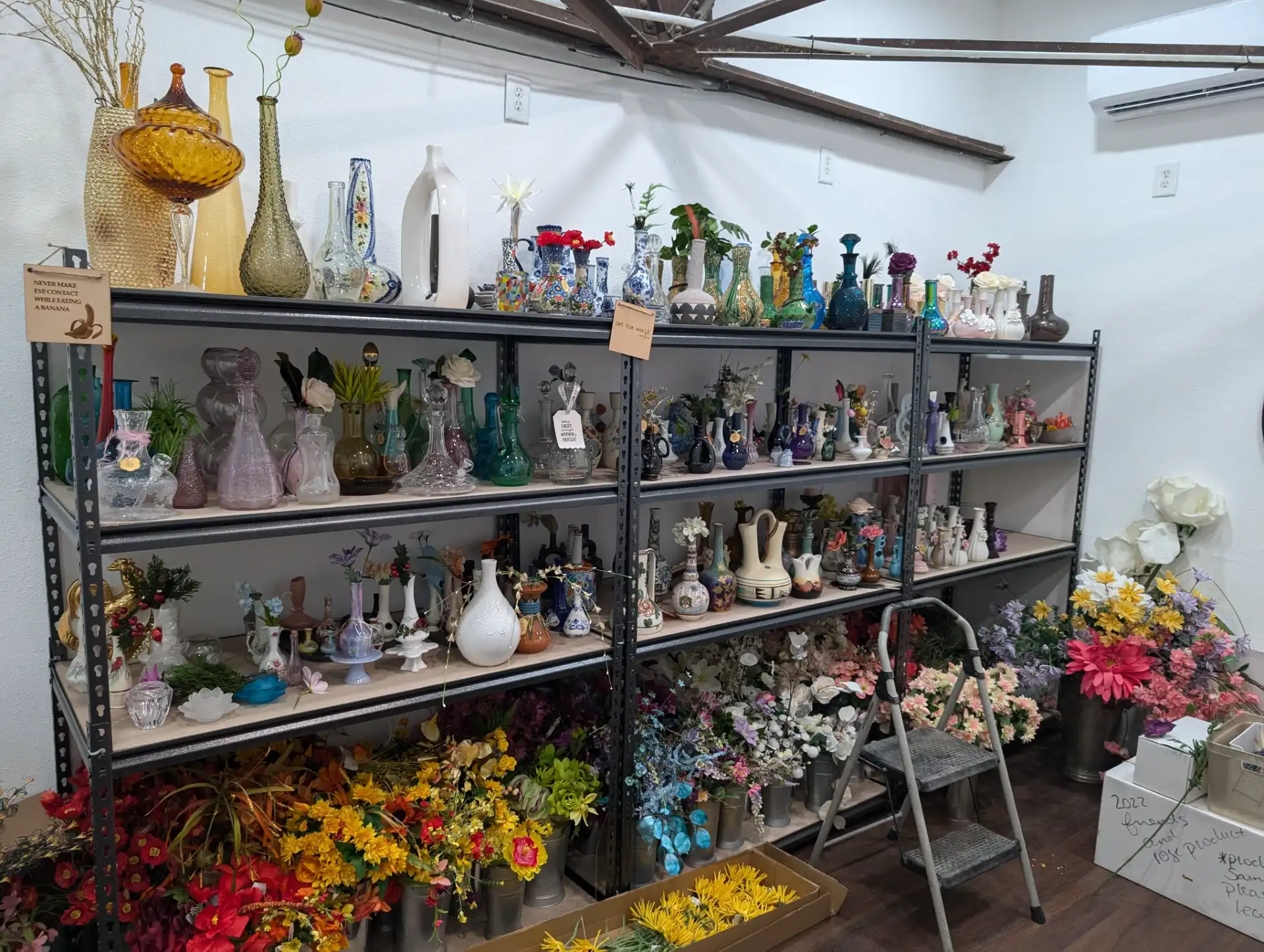Shelves of packed fine art and decorative pieces ready for shipment